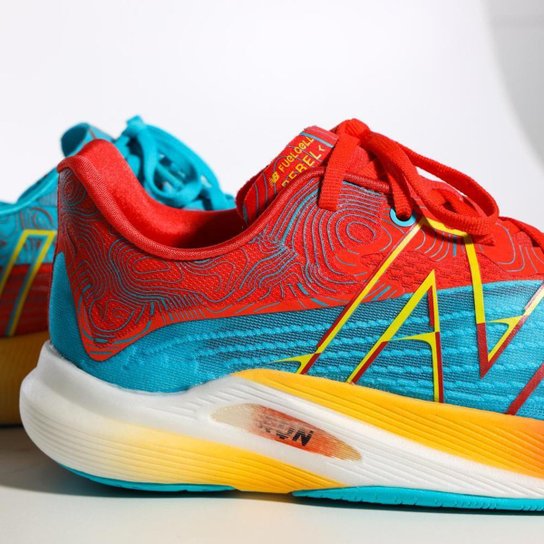 Tênis New Balance Fuelcell Rebel Azul Laranja