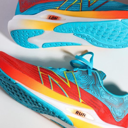 Tênis New Balance Fuelcell Rebel Azul Laranja